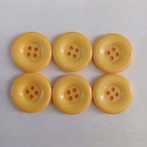 Gele knopen 6 stuks